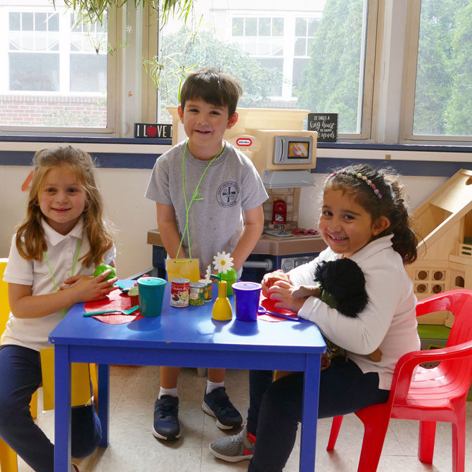 Pre-K students interacting at Saint Michael School