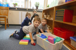 Nursery students interacting at Saint Michael School