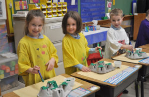 Kindergarten art class painting at Saint Michael School